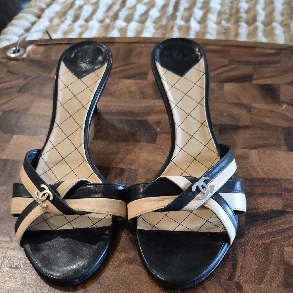 CHANEL Black and Cream Quilted Slide Mules with CC Accent